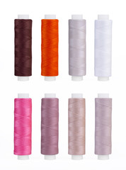 Set of sewing thread coils, miscellaneous colours, isolated on white