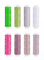 Set of sewing thread coils, miscellaneous colours, isolated on white