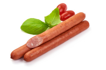 Smoked beef sausages with basil leaves, close-up, isolated on white background
