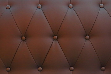 button upholstery brown leather texture background