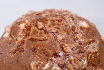 Bun made from rye flour with onions. Shallow depth of field