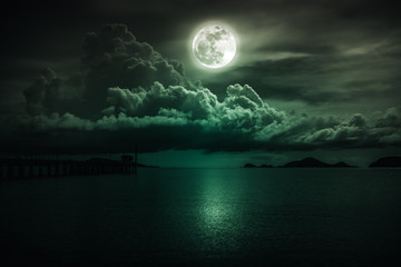 Fototapeta na wymiar Landscape of sky with full moon on seascape to night. Serenity nature.