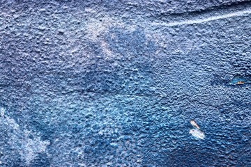 Detailed surface of aged and weathered concrete and cement walls with cracks in high resolution
