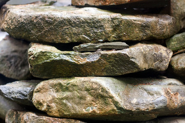 Fototapeta na wymiar Pile of large stones abstract natural background