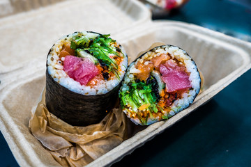 Sushi burrito is a new fusion Japanese food with modern society, which created an amazing taste and texture. It is being serve as one of the most famous dish in New York city that everybody should eat - obrazy, fototapety, plakaty
