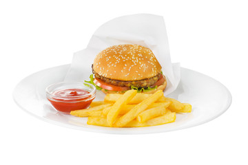 Burger packaged with beef, meat cutlet, tomato, leaf lettuce, French fries and ketchup, barbecue sauce on plate, side view, isolated white background
