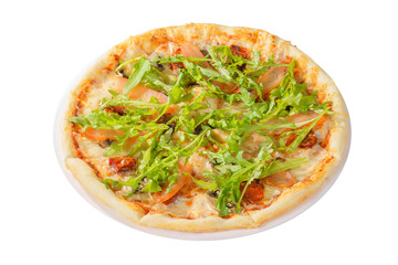 Pizza with arugula, dried tomatoes and mushrooms whole round, cut into pieces, on a white isolated background, side view