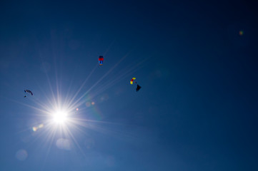 Paraglider flies paraglider in the sky. Paragliding.