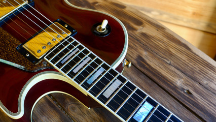 electric guitar on the wooden boards