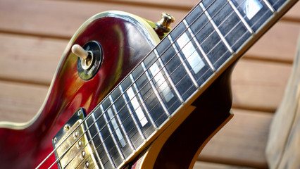 electric guitar on the wooden boards