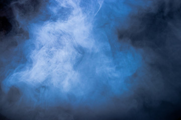 Fototapeta na wymiar Blue smoke and dense fog on black background. 