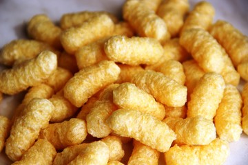 corn sticks without sugar and gluten on a gray table, close-up. food allergen concept, gluten free