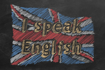 Hand drawing british flag with text "I speak English" on blackboard.