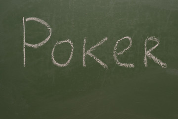 Handwritten chalk poker inscription on green board