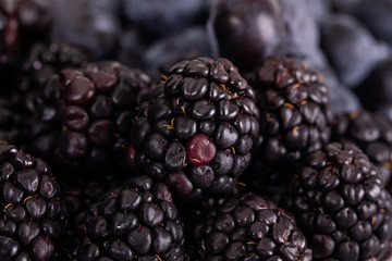 Blueberries and blackberries berries close-up.