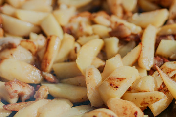 Roasted Golden Potatoes on a rustic wooden background.