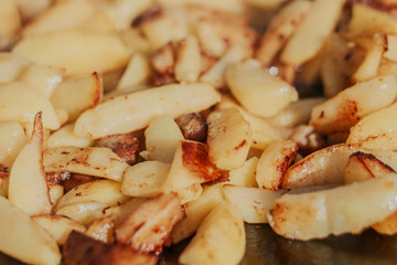 Roasted Golden Potatoes on a rustic wooden background.