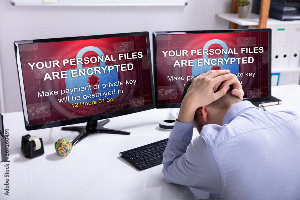 Poster businessman with computer ransomware screen