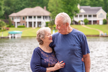 Portrait of a beautiful senior couple in love, celebrating a long, happy marriage and successful retirement.