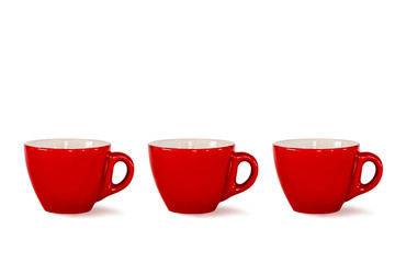 red mugs on white background isolate