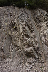 The protruding rock on the mountainside.