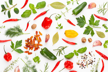 Spice herbal leaves and chili pepper on white background. Vegetables pattern. Floral and vegetables on white background. Top view, flat lay.