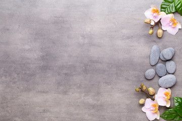 Orchid beauty flowers on vintage background. Spa background, spa therapy, beauty. Spa treatment.