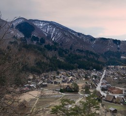 Village of Sharikawa-Go is a UNESCO World Heritage Site.  Panoramic view of the village from the top and view of mountains.