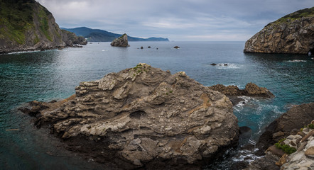 Fototapeta na wymiar The coast from San Juan de Gaztelugatxe, Dragon-stone in Game of Thrones, bridge and stone stairs