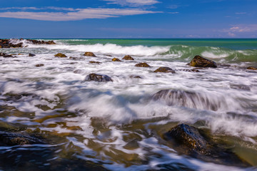 Blue sky and white waves at Koh Mak, Thailand