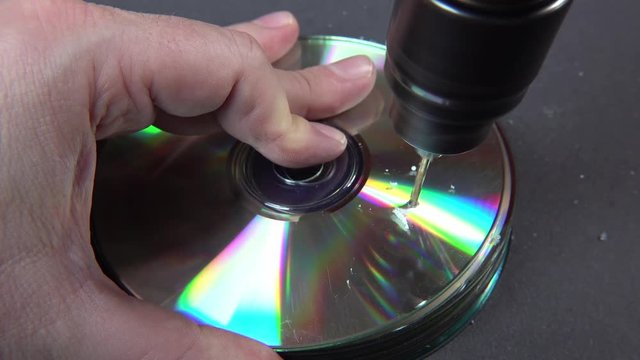 Concept of deleting big data by drilling a hole into the DVD RAM