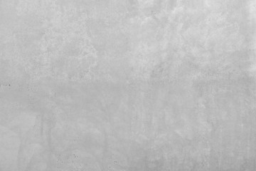 Graue Betonwand mit rauer Oberfläche. Steinwand mit leichter Struktur der Abnutzung....