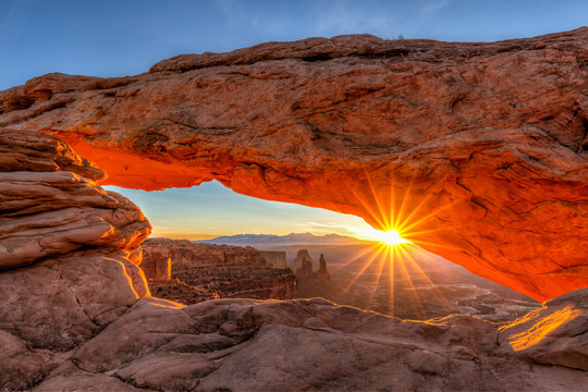 March Sunrise Through Mesa Arch - Powered by Adobe