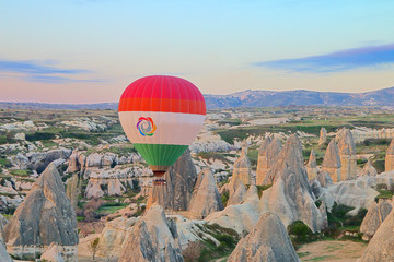 Quiet balloon flight over the mountains of Cappadocia in the early morning.