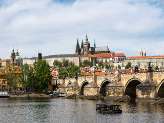 the River Vltava flows through the city of Prague