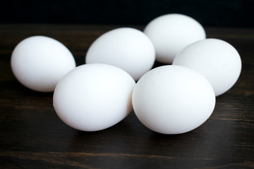Eggs on a Dark Wood Background