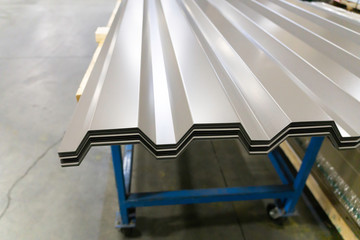 Corrugated galvanised metal roofing sheets on factory workshop