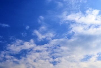 Beautiful white cloud formations in a deep blue sky on a sunny day