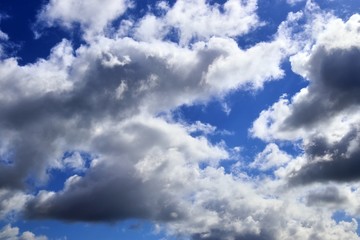 Beautiful white cloud formations in a deep blue sky on a sunny day