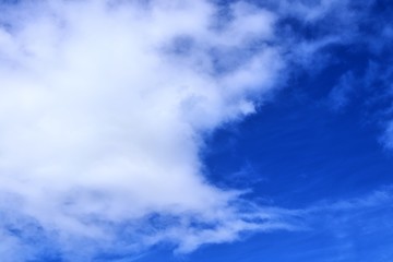 Beautiful white cloud formations in a deep blue sky on a sunny day