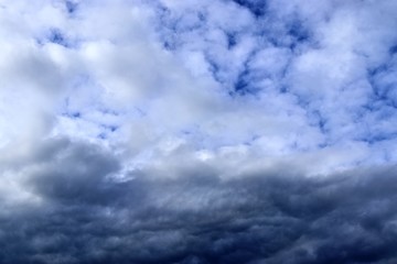 Beautiful white cloud formations in a deep blue sky on a sunny day