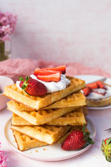 Homemade belgian Waffle. Strawberies and whiped cream.