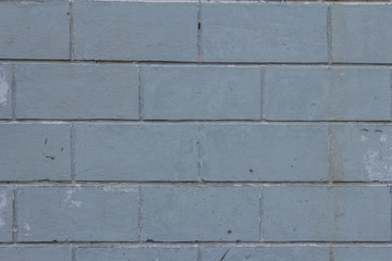 The brick texture, wall, with cracks and scratches can be used as a background