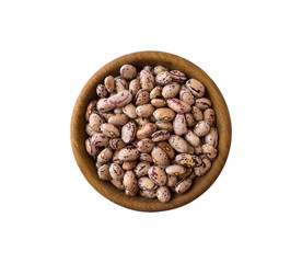 Kidney beans isolated on white background. Top view. Kidney beans in a wooden bowl isolated on white background. Kidney beans with copy space for text.