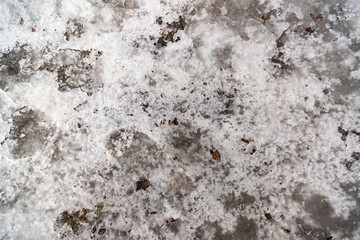 Dirty snow with footprints