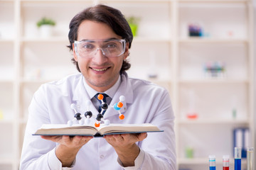 Young male scientist working in the lab 