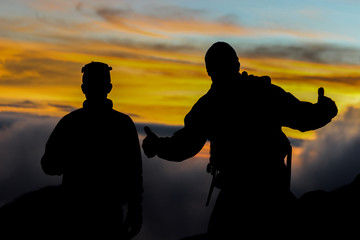 silhouette of man at sunset