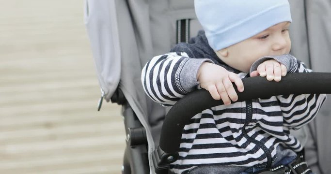 Baby boy in a stroller