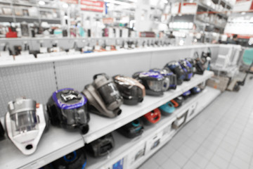 Close up blurred concept of DIY shopping center megamall with Appliances. Goods for home. Merchandising. Commercial LED lighting.