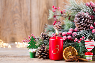 Christmas greeting card. Festive decoration on wooden background. New Year concept. Copy space.  Flat lay. Top view.